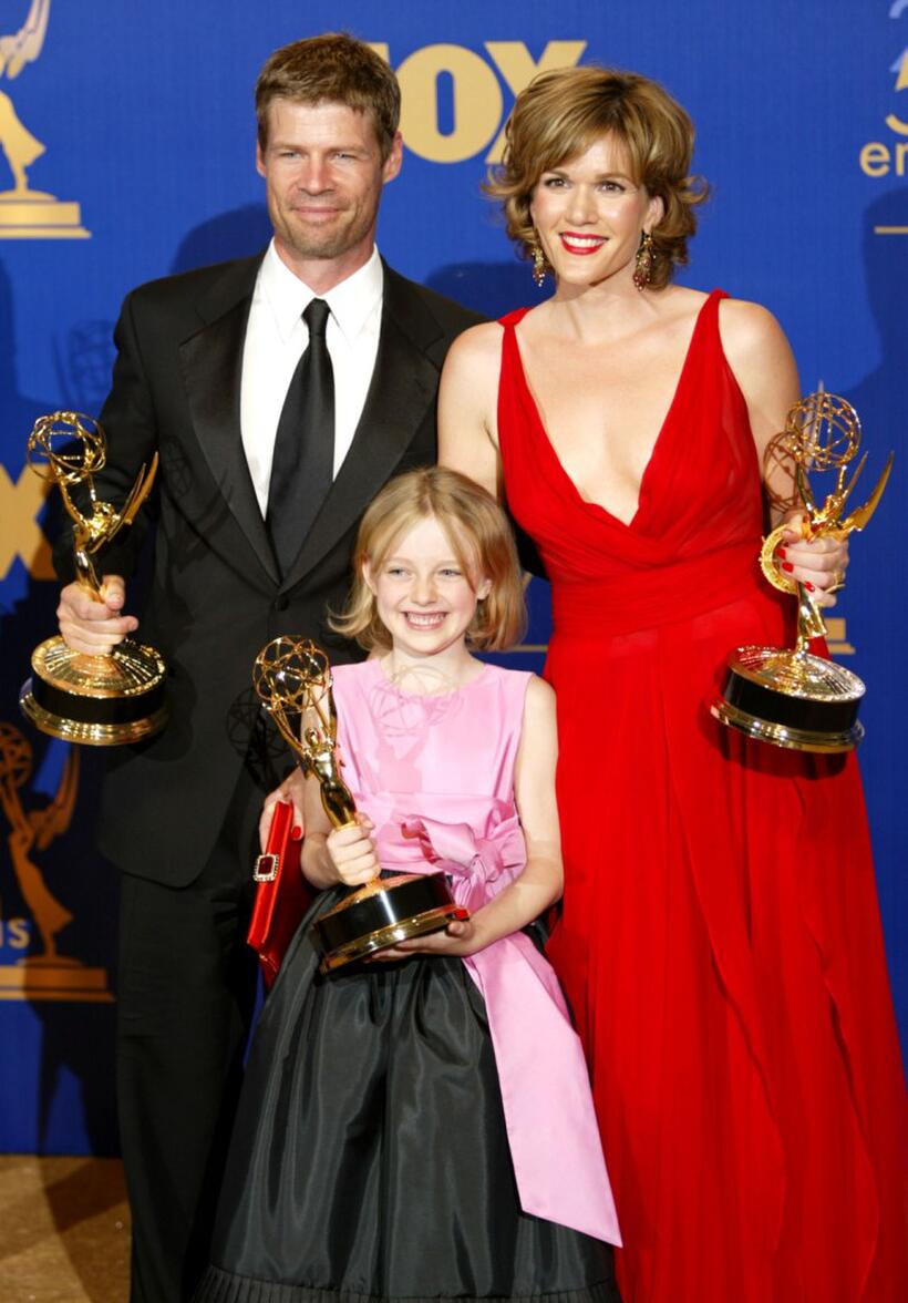 Joel Gretsch, Dakota Fanning and Catherine Dent at the 55th Annual Primetime Emmy Awards.