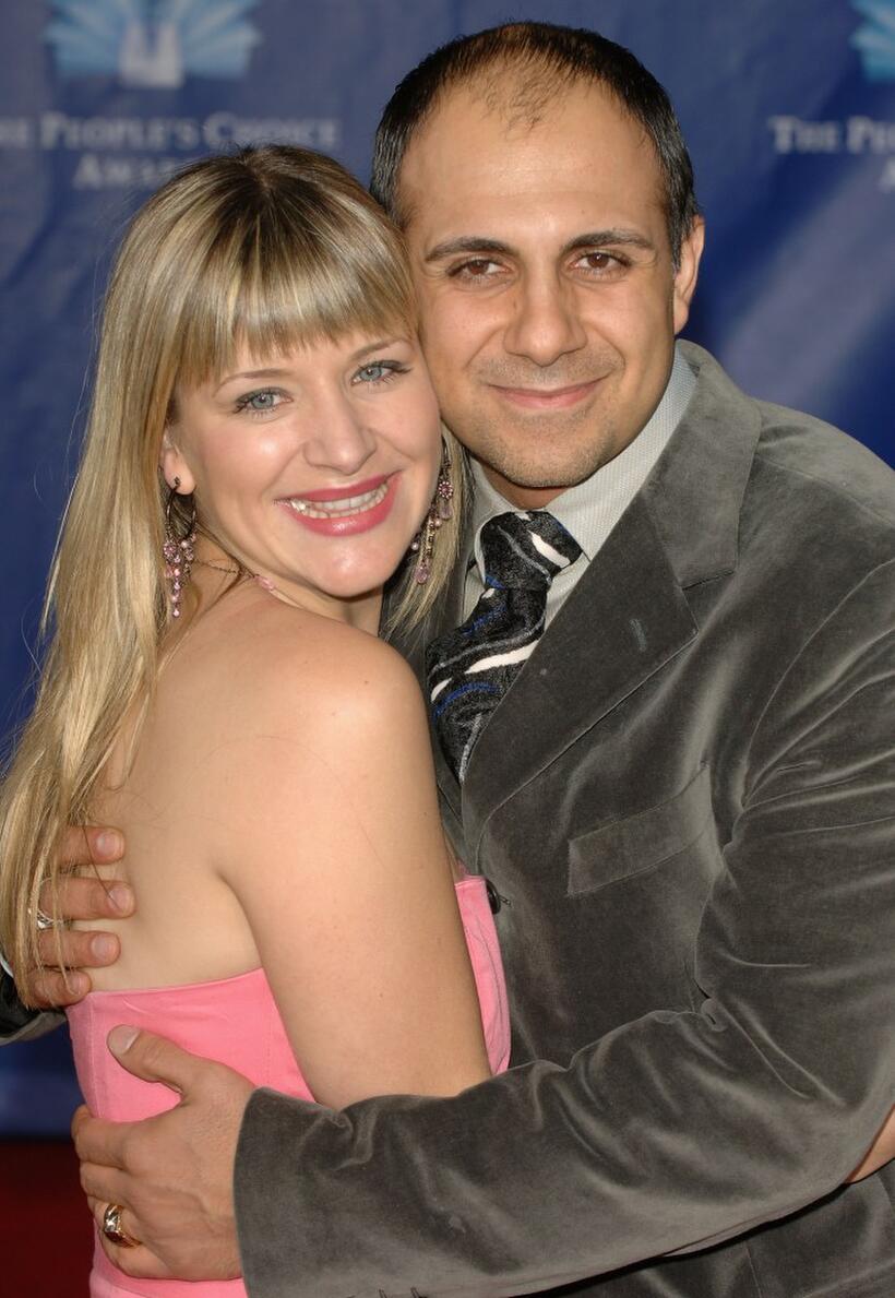 Anthony Azizi and Guest at the 32nd Annual People's Choice Awards.