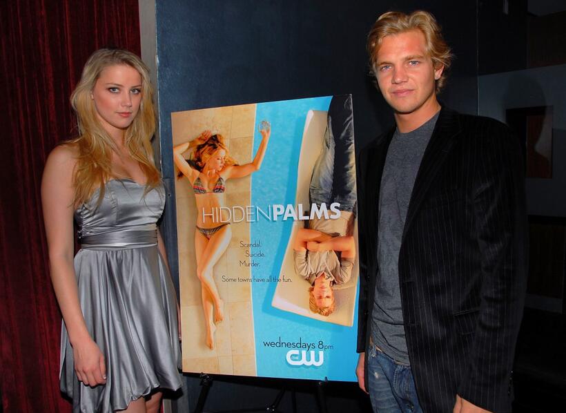 Amber Heard and Taylor Handley at the premiere of "Hidden Palms."