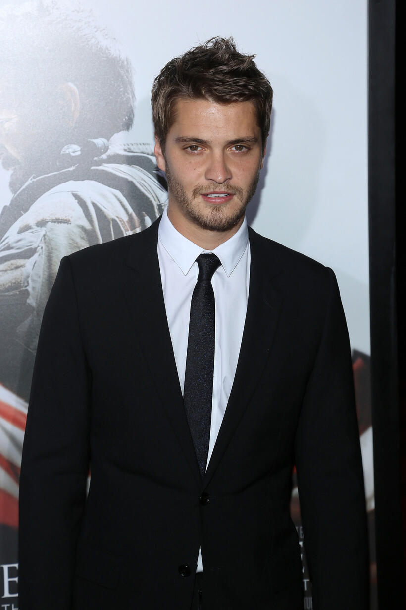 Luke Grimes at the New York premiere of "American Sniper."