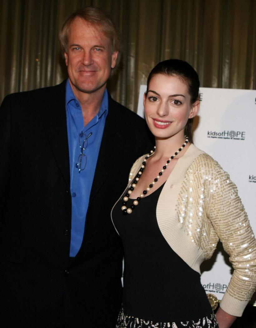 John Tesh and Anne Hathaway at the Kids of Hope Tsunami Relief Gala.