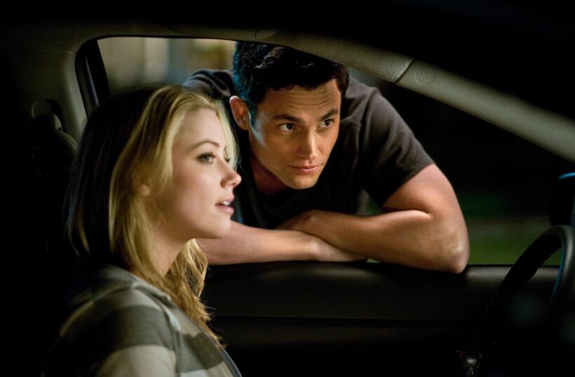 Amber Heard and Penn Badgley in "The Stepfather."