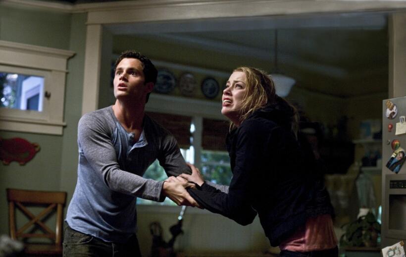 Penn Badgley and Amber Heard in "The Stepfather."