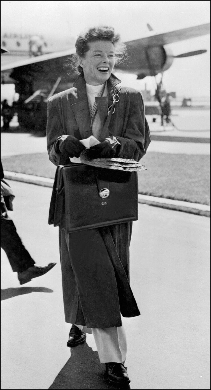 Katharine Hepburn arrives at an airport in London.