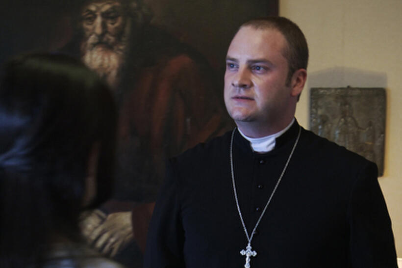 Evan Helmuth as Fr. David Keane in ``The Devil Inside.''