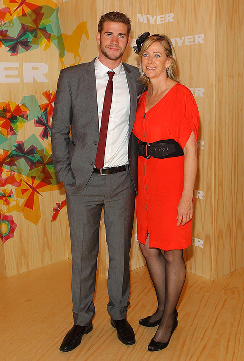 Liam Hemsworth and Leonie Hemsworth at the Myer marquee during Emirates Melbourne Cup Day in Australia.