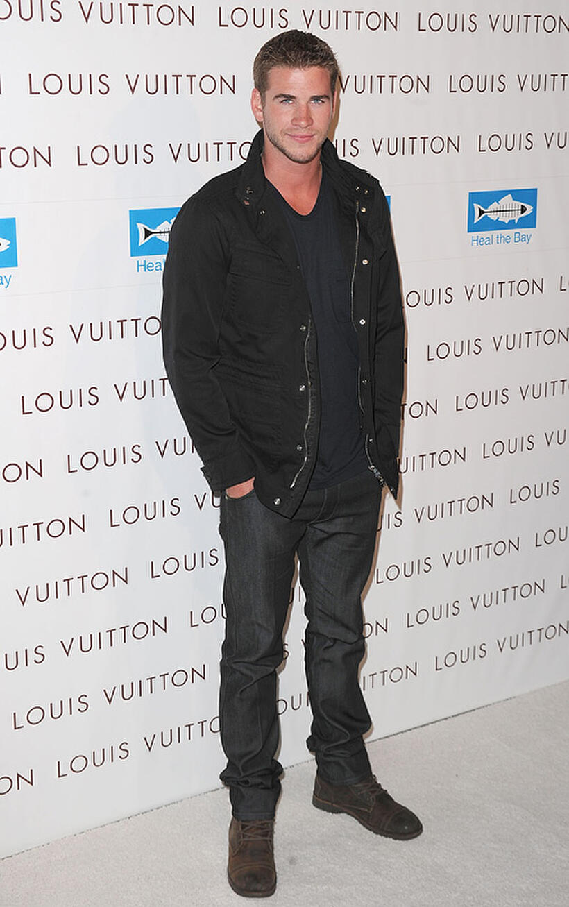 Liam Hemsworth at the opening of "Louis Vuitton Santa Monica To Benefit Heal The Bay" in California.