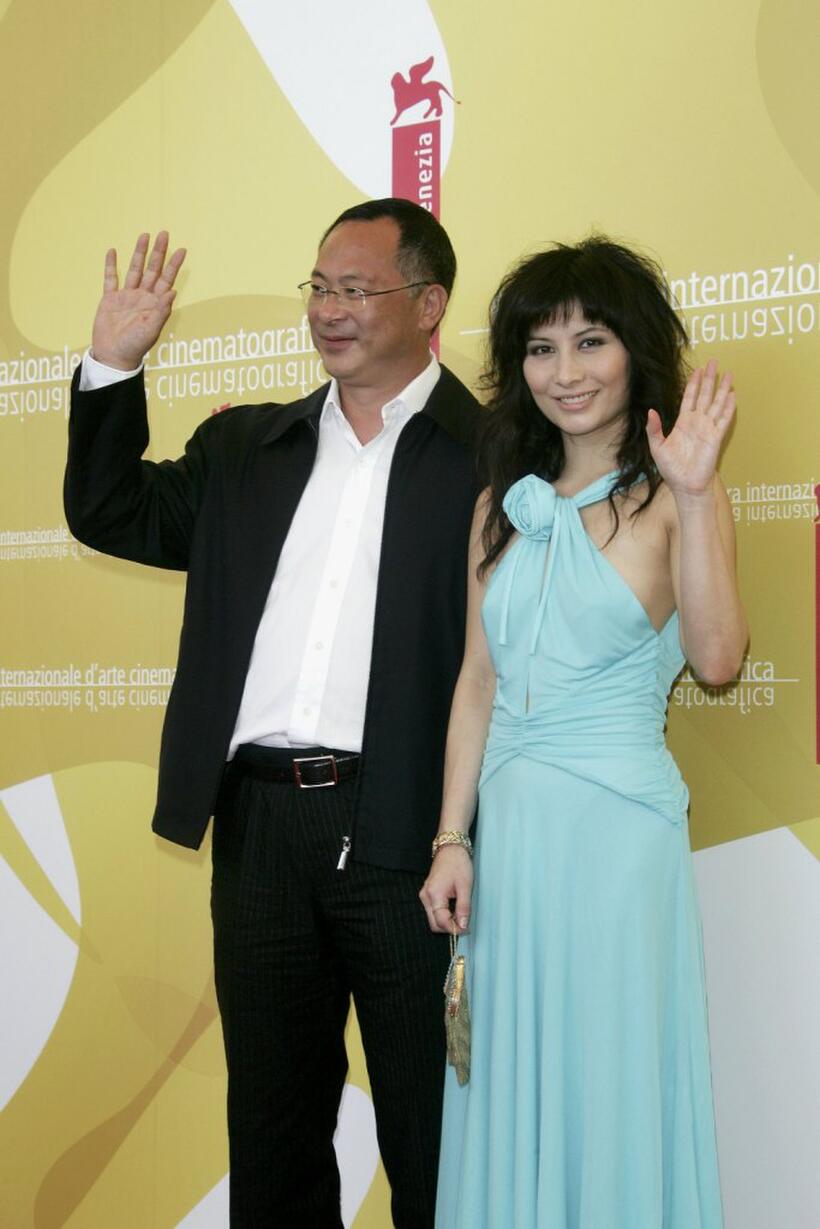 Director Johnnie To and Josie Ho at the photocall of "Exiled" during the 63rd Venice Film Festival.