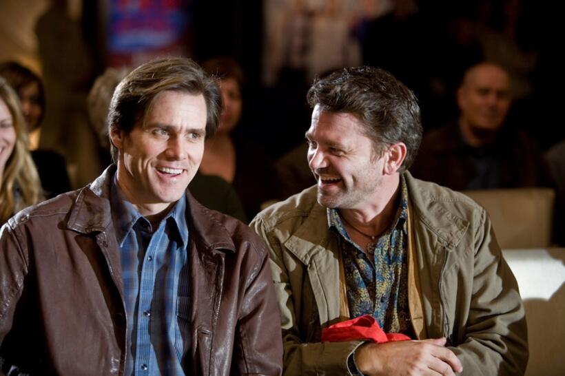 Jim Carrey as Carl and John Michael Higgins as Nick in "Yes Man."