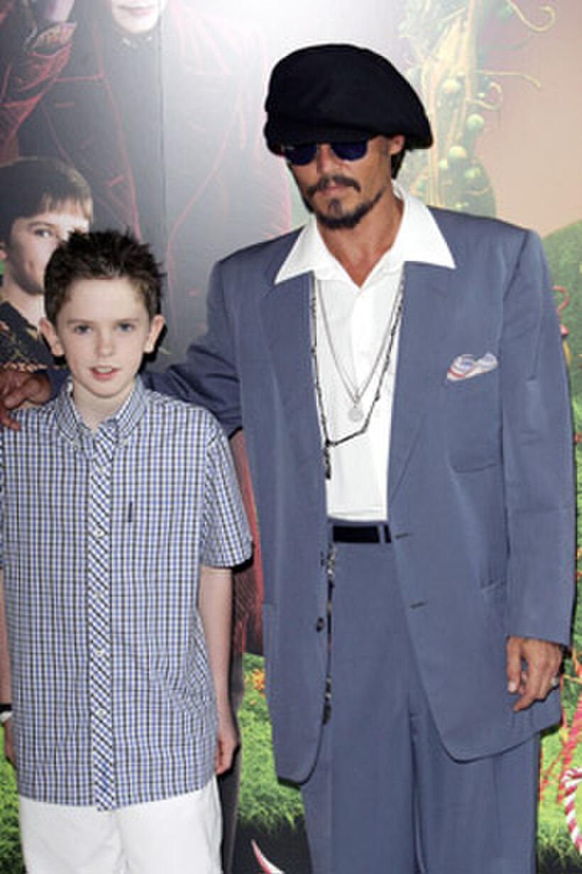 Freddie Highmore and actor Johnny Depp at the UK Premiere of "Charlie And The Chocolate Factory."
