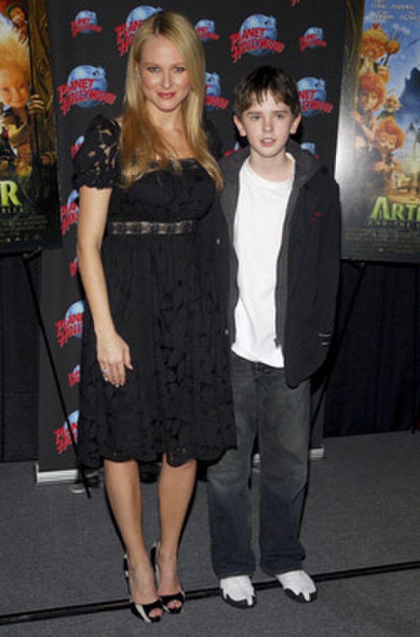 Musician Jewel and Freddie Highmore at a promotion at promotion at Planet Hollywood in N.Y. for "Arthur and the Invisibles."