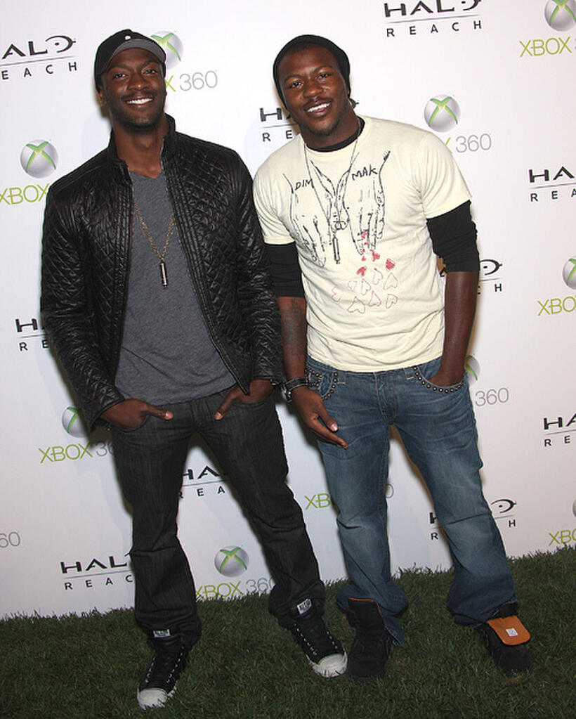 Aldis Hodge and Guest at the launch of XBox 360's "Halo Reach" in California.