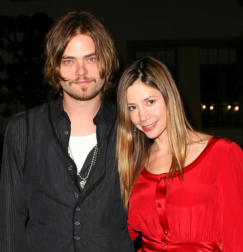 Christopher Backus and Mira Sorvino at the California premiere of "Sweeney Todd."