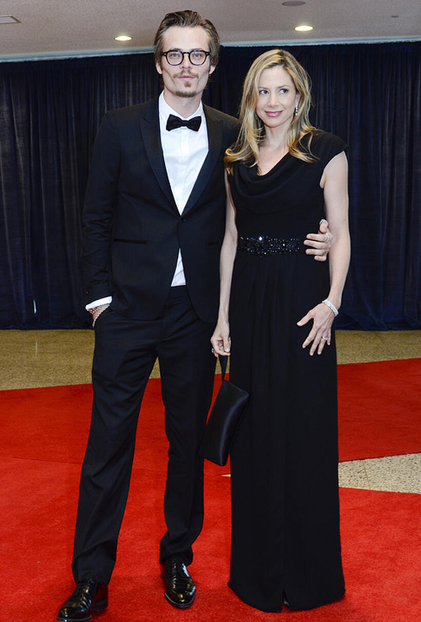 Christopher Backus and Mira Sorvino at the red carpet of 2011 White House Correspondents' Association Dinner.