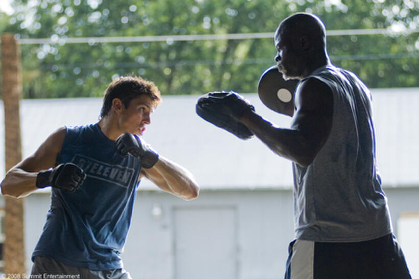 Sean Faris and Dijimon Hounsou in "Never Back Down."