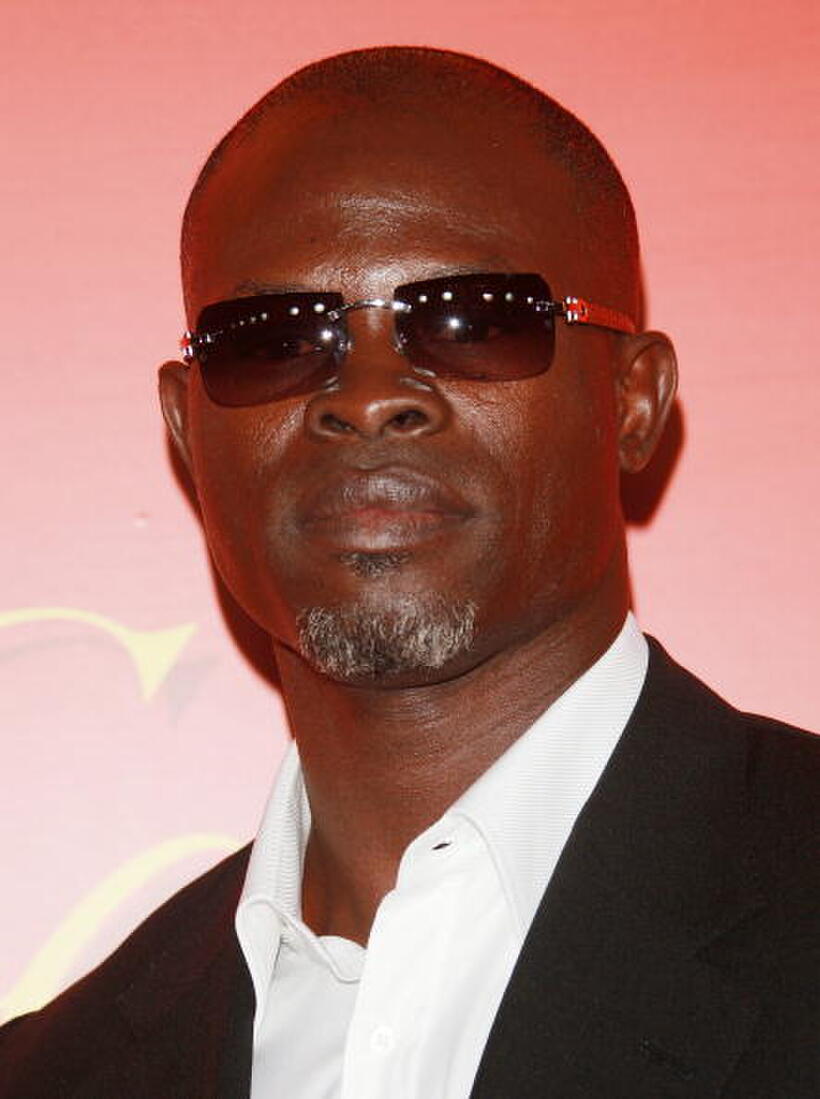 Djimon Hounsou attends a cocktail party in celebration of The Cartier Charity Love Bracelet.