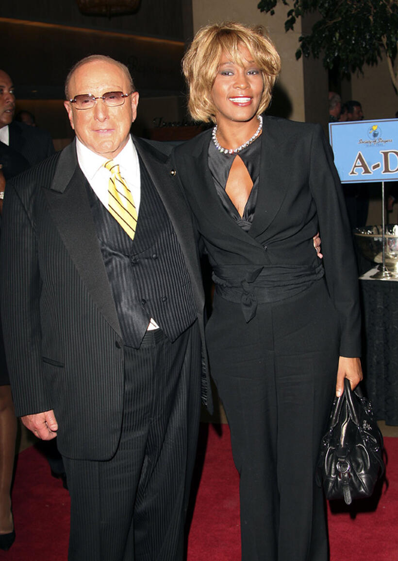 Whitney Houston and producer Clive Davis at the 15th Annual Ella Awards in California.