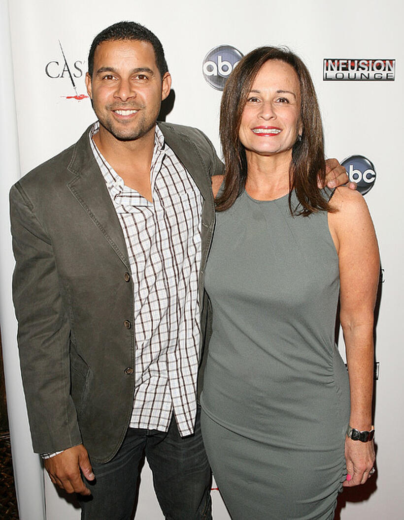 Jon Huertas and executive producer Laurie Zaks at the Season 3 California premiere of "Castle."