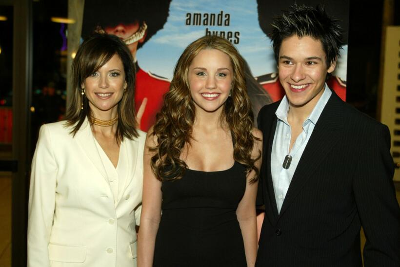 Kelly Preston, Amanda Bynes and Oliver James at the premiere of "What A Girl Wants."