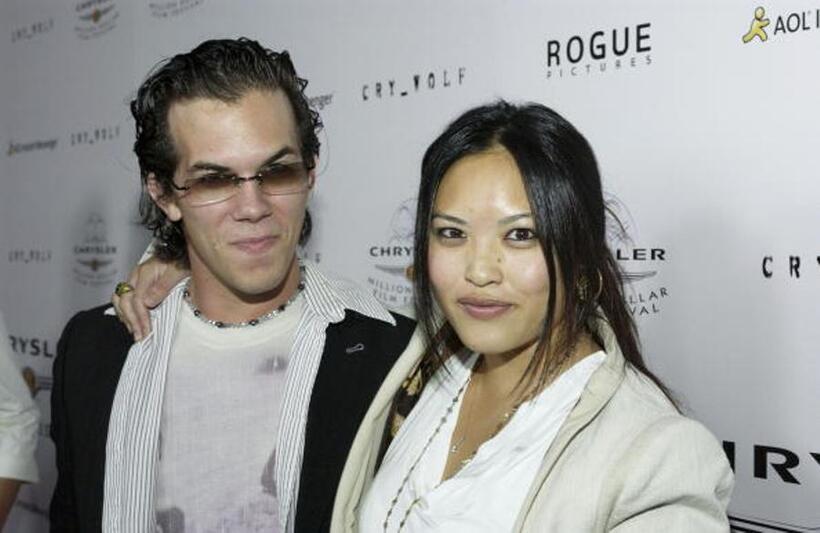 Jesse Janzen and Kristy Wu at the premiere of "Cry Wolf."