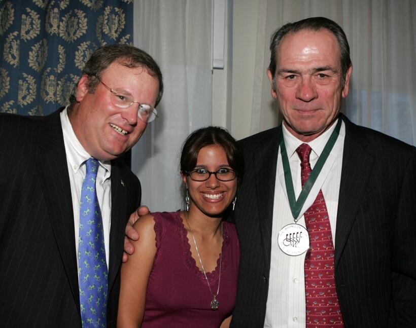 Tommy Lee Jones, John Gray and his wife Carrie at the Great Sports Legends Dinner at the Waldorf Astoria.
