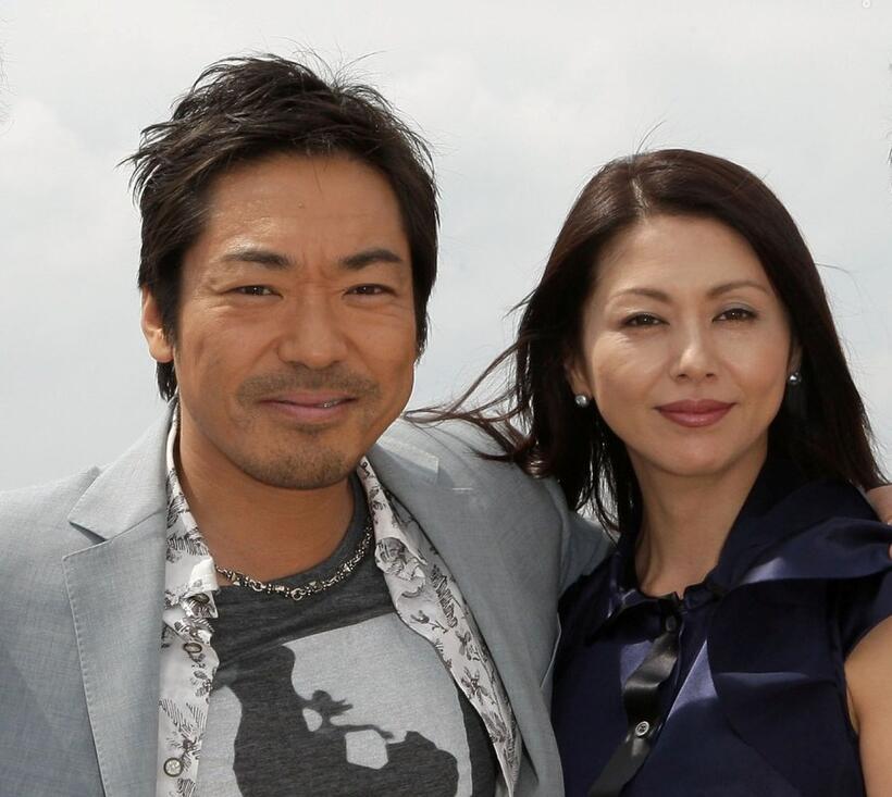 Teruyuki Kagawa and Kyoko Koizumi at the cast photocall of "Tokyo Sonata" during the 61st International Cannes Film Festival.