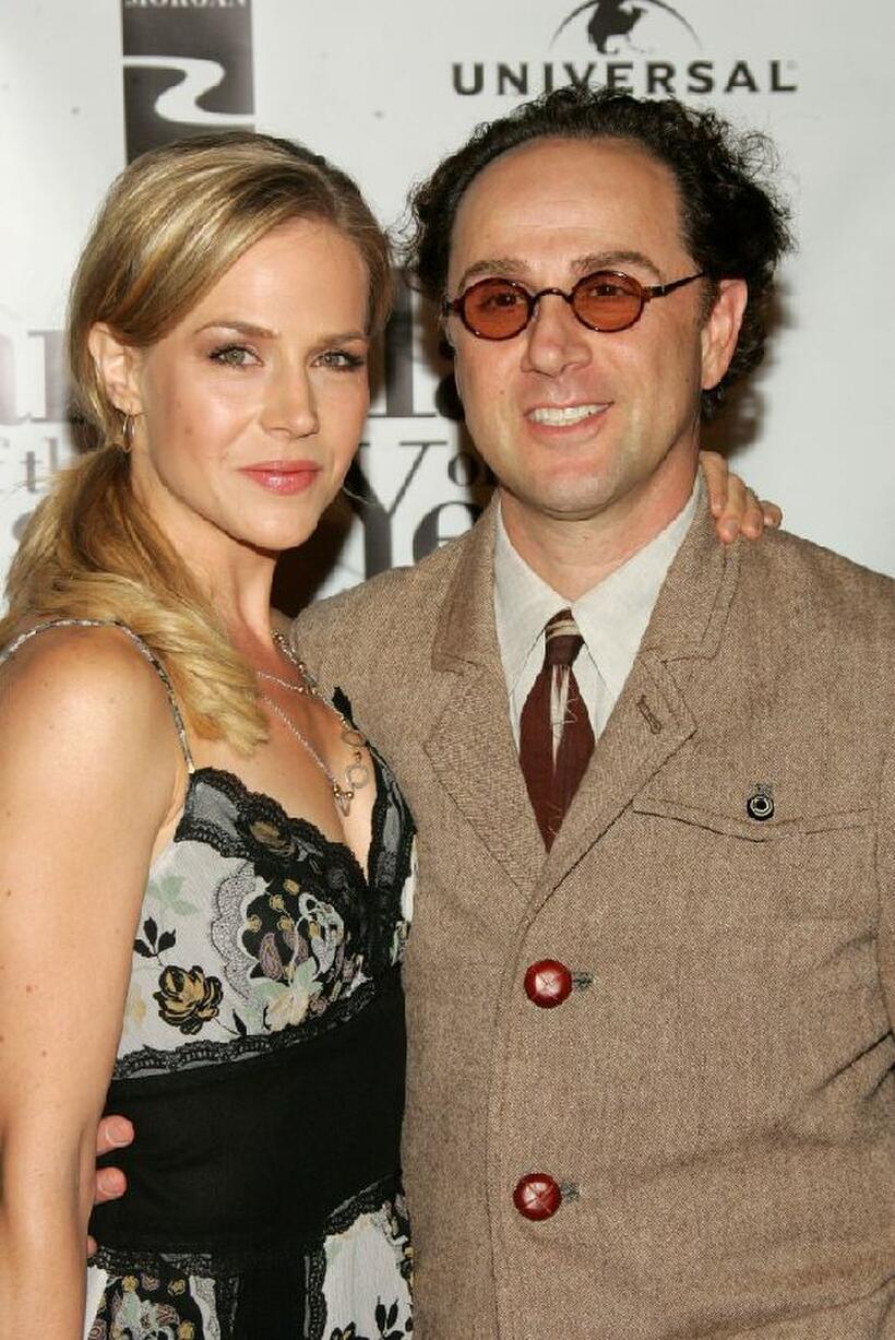 Julie Benz and John Kassir at the premiere of "Man of the Year."