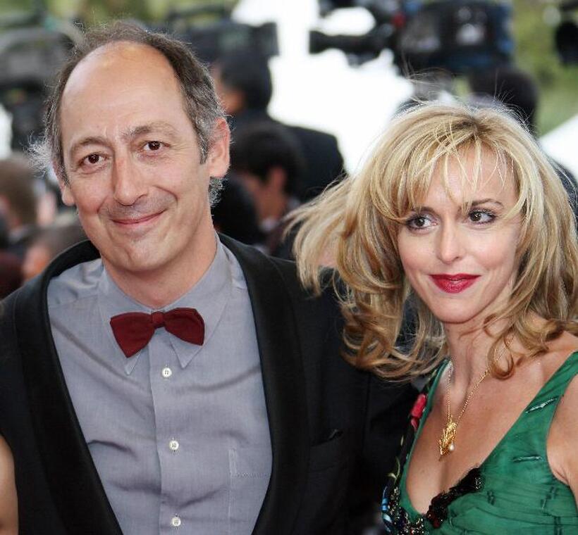 Sam Karmann and Guest at the premiere of "Over the Hedge" during the 59th edition of the Cannes Film Festival.