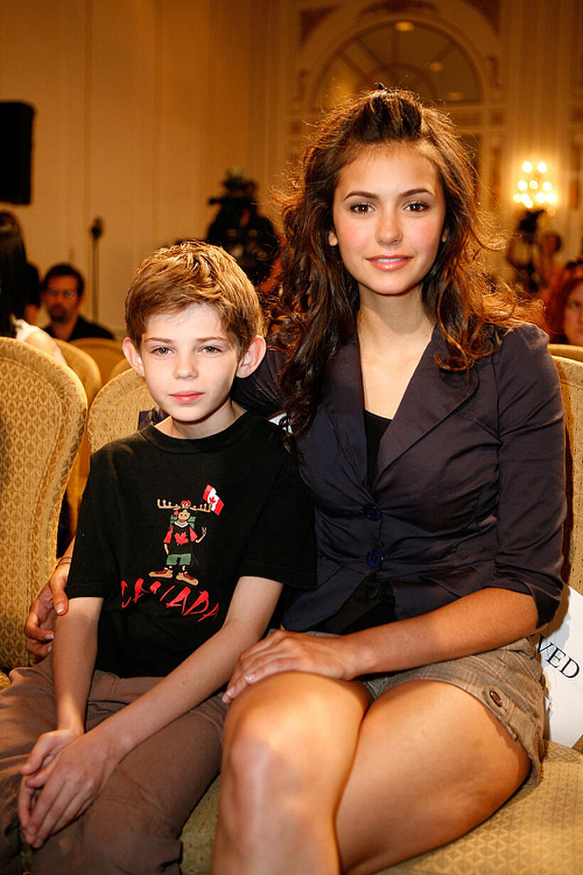 Robbie Kay and Nina Dobrev at the TIFF 2007 Press Conference for "Fugitive Pieces" during the Toronto International Film Festival.