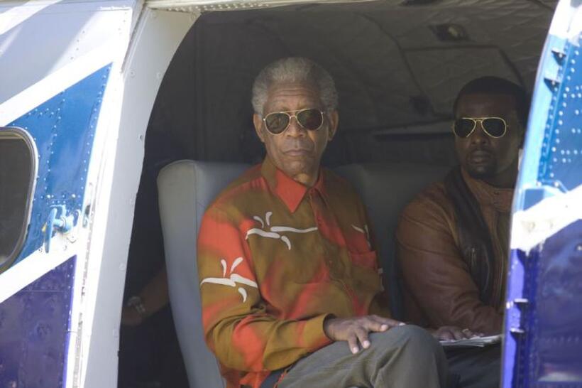 Morgan Freeman as Nelson Mandela and Tony Kgoroge as Jason Tshabalala in "Invictus."