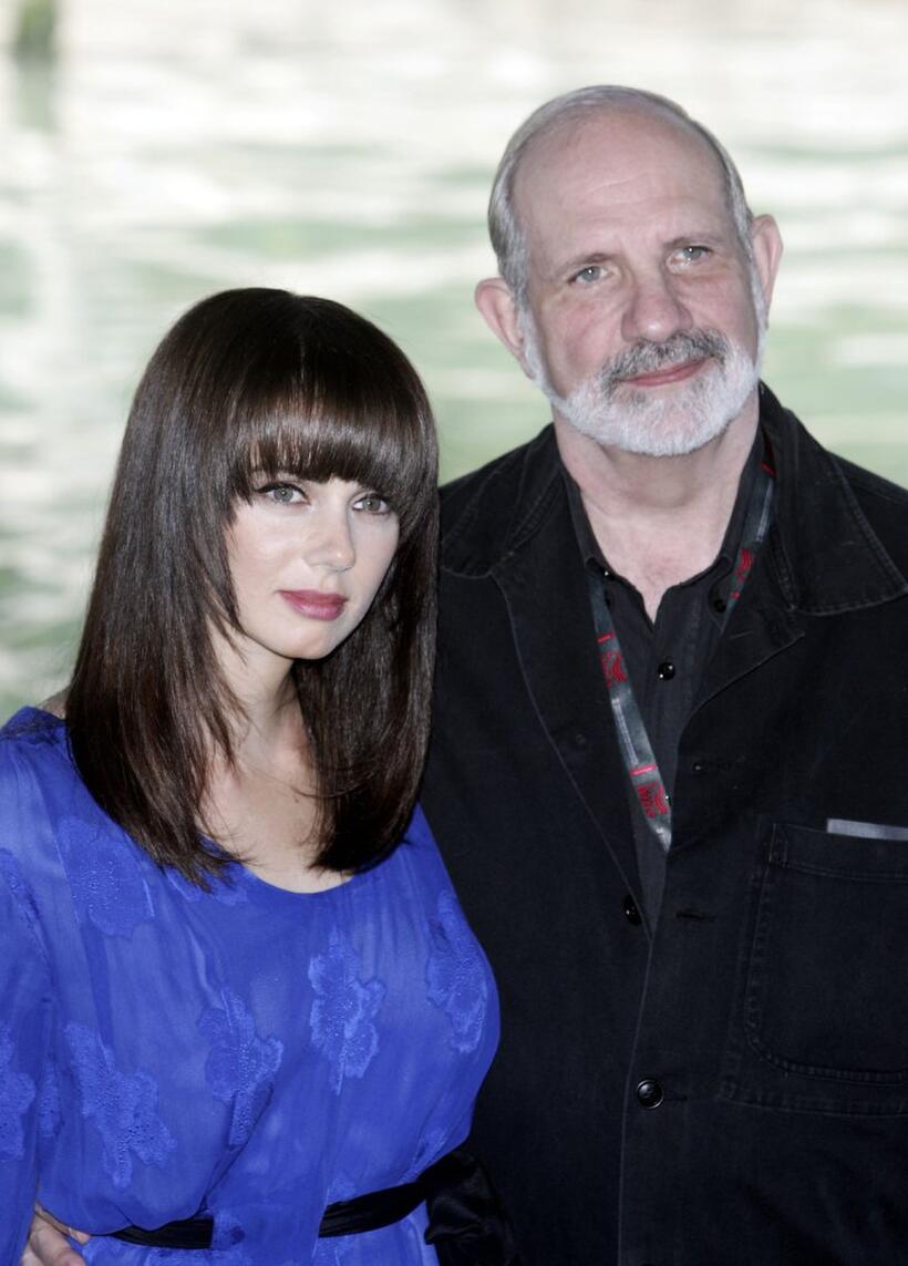 Mia Kirshner and Brian De Palma at the photo call of "The Black Dahlia", at the 63nd Venice Film Festival.