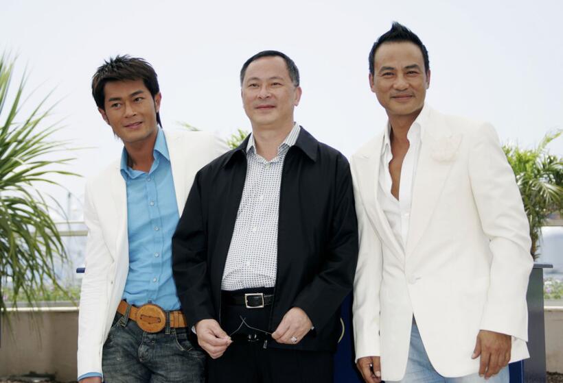 Louis Koo, director Johnny To and Simon Yam at the photocall of "Election 2" during the 59th International Cannes Film Festival.