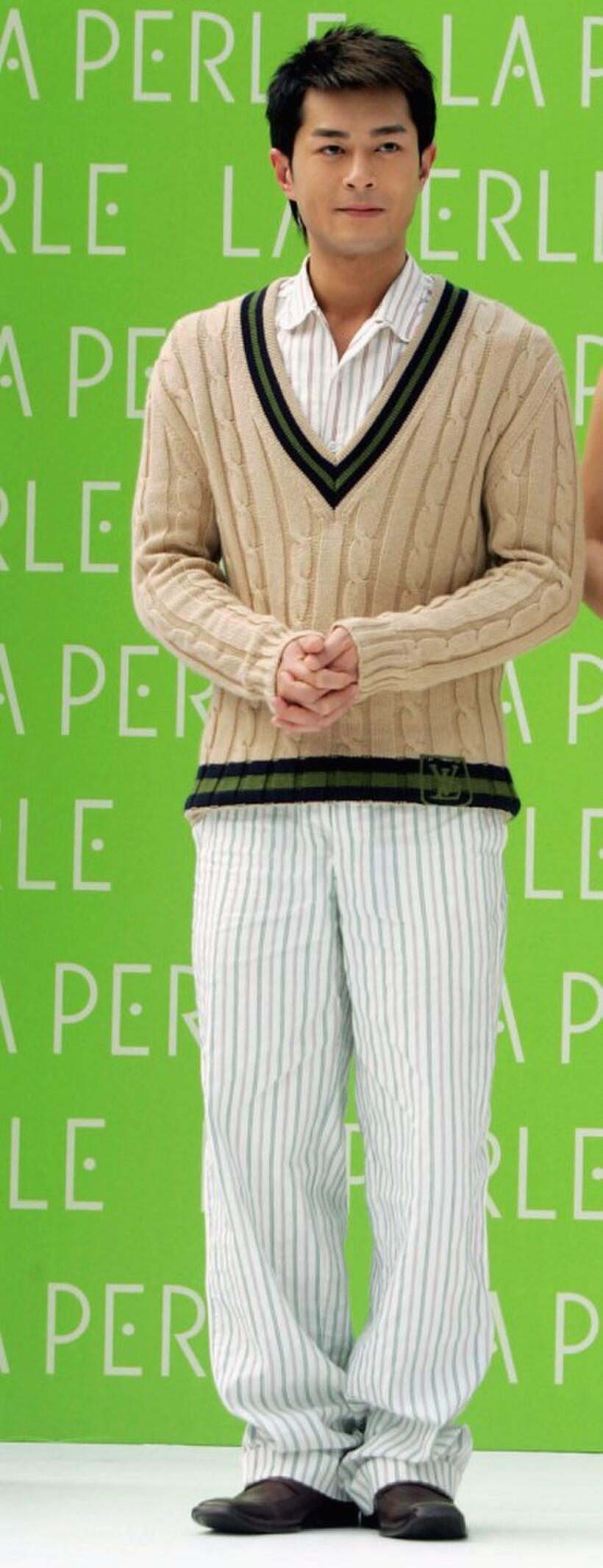 Louis Koo at the La Perle Spring and Summer Series Fashion Show.