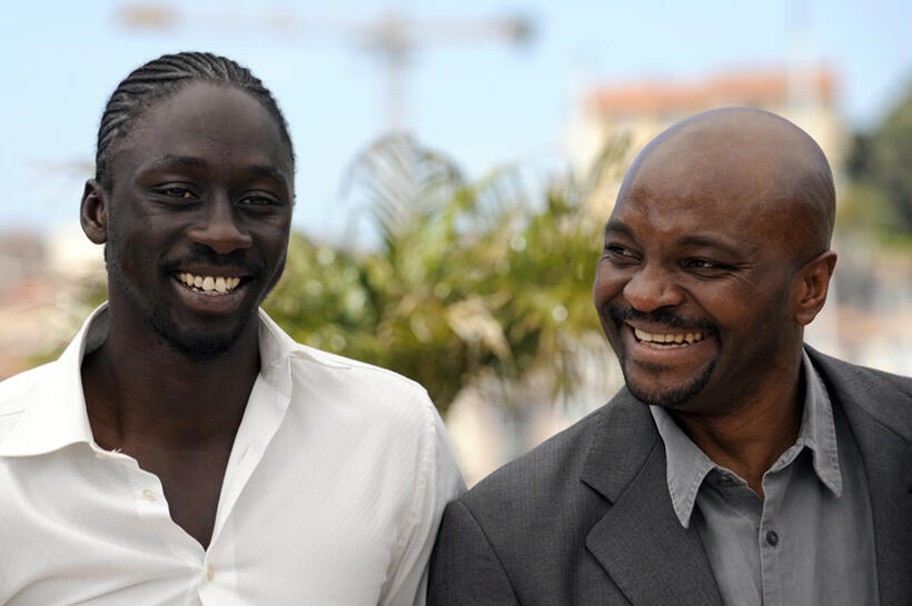 Diouc Koma and Emil Abossolo M'Bo at the photocall of "A Screaming Man" during the 63rd Annual Cannes Film Festival.
