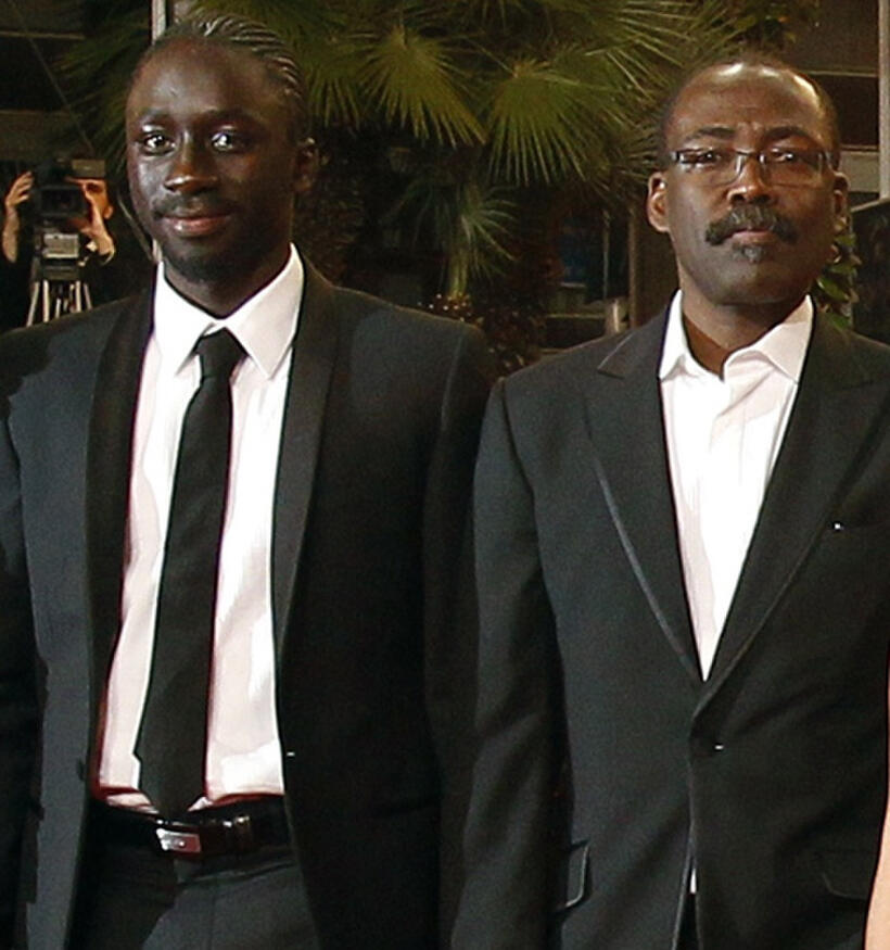Diouc Koma and director Mahamat-Saleh Haroun at the premiere of "Un Homme Qui Crie" during the 63rd Cannes Film Festival.