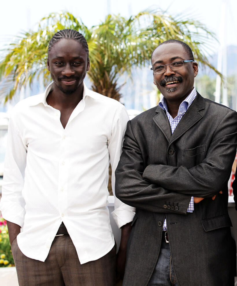 Diouc Koma and director Mahamat-Saleh Haroun at the photocall of "A Screaming Man" during the 63rd Annual Cannes Film Festival.