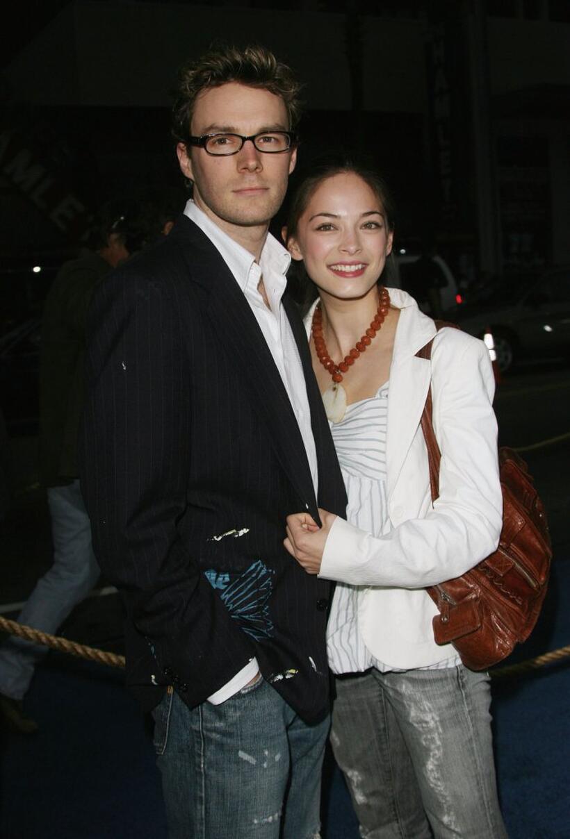 Kristin Kreuk and her guest at the premiere of "Poseidon."