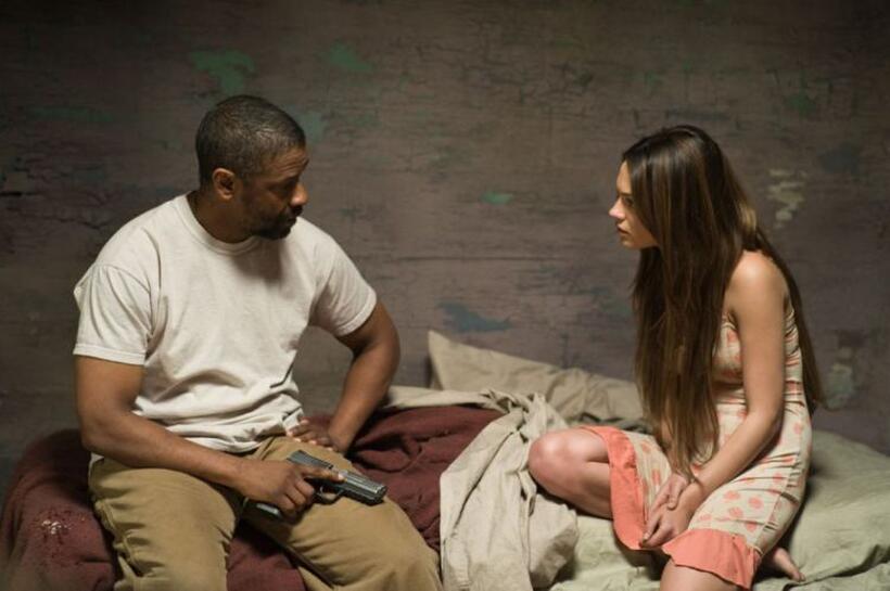 Denzel Washington as Eli and Mila Kunis as Solara in "The Book of Eli."
