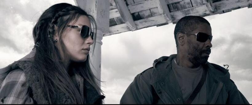 Mila Kunis as Solara and Denzel Washington as Eli in "The Book of Eli."