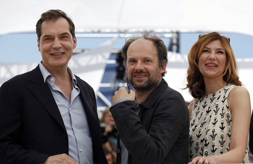 Samuel Labarthe, Denis Podalyde and Florence Pernel at the photocall of "La Conquete" during the 64th Cannes Film Festival.