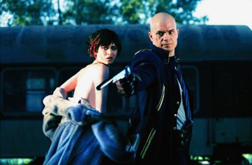 Olga Kurylenko and Timothy Olyphant in "Hitman."