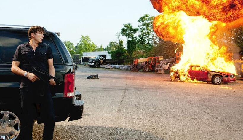 Ashton Kutcher as Spencer in "Killers."