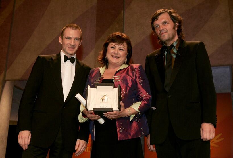 Hanna Laslo, Ralph Fiennes and Emir Kusturica at the Closing Awards Ceremony during the 58th International Cannes Film Festival.