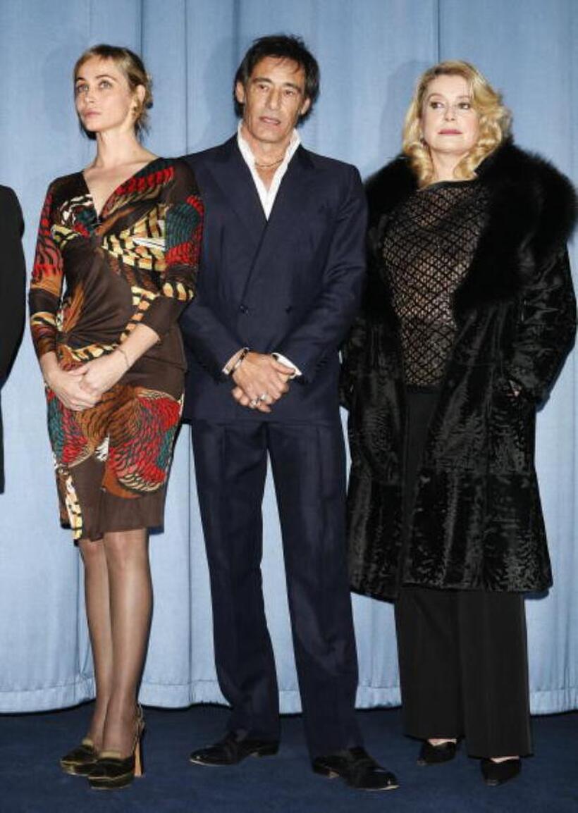 Emmanuelle Beart, Gerard Lanvin and Catherine Deneuve at the premiere of "Le Heros de la Famille."