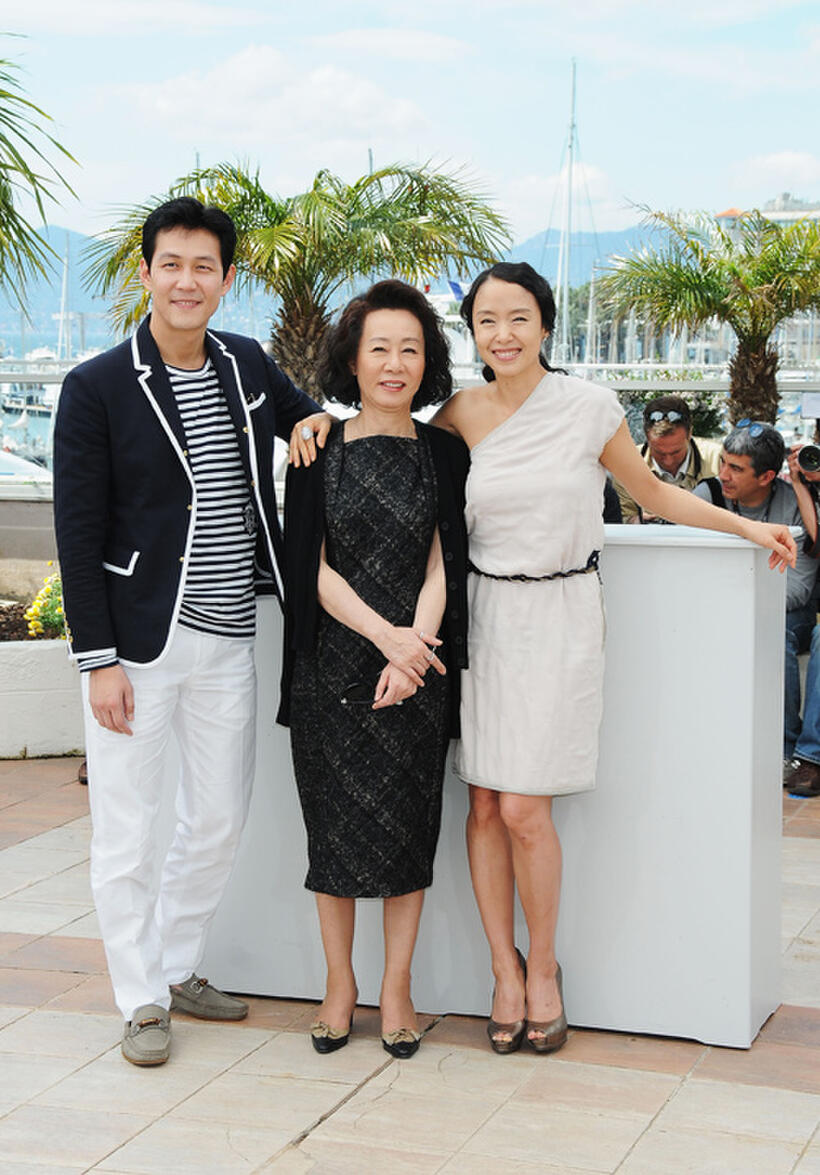 Lee Jung-Jae, Youn Yuh-jung and Jeon Do-yeon at the photocall of "The Housemaid"  during the 63rd Annual Cannes Film Festival in France.