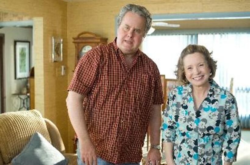 Adam LeFevre as Mr. Kettner and Debra Jo Rupp as Mrs. Kettner in "She's Out of My League."