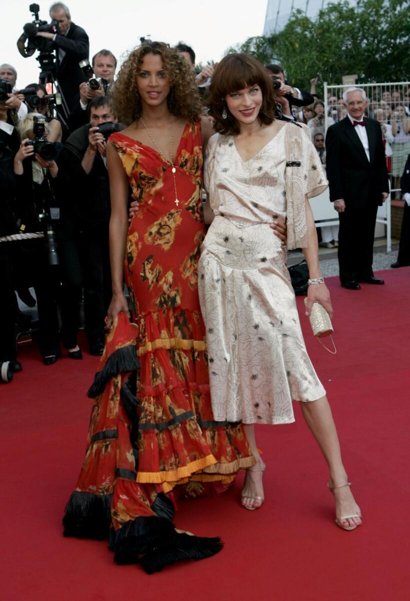Noemie Lenoir and Milla Jovovich at the screening of "Three Burials of Melquiades Estrada" during the 58th International Cannes Film Festival.