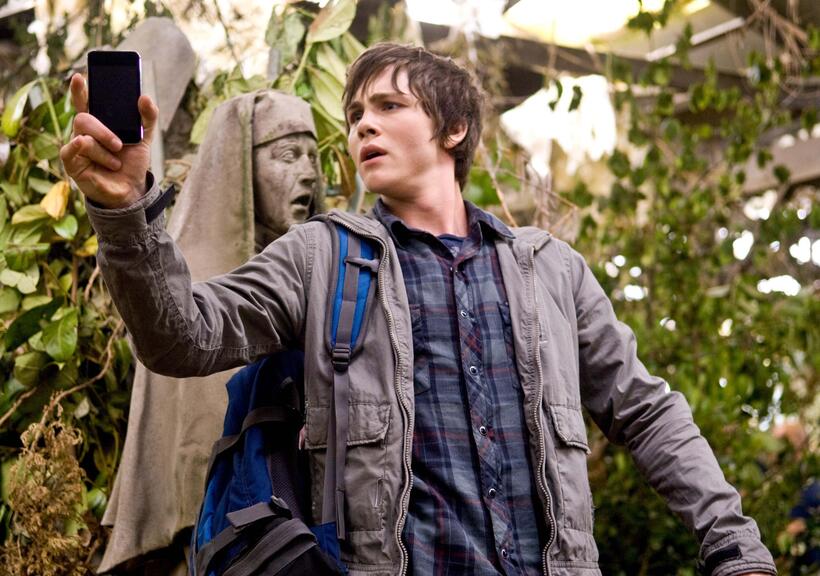 Percy Jackson (Logan Lerman) uses his PDA to track the deadly Gorgon Medusa - while avoiding Medusa's deadly gaze that turns her victims to stone in "Percy Jackson & the Olympians: The Lightning Thief."