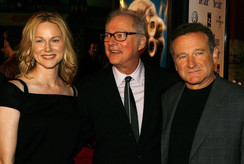 Barry Levinson, Laura Linney and actor Robin Williams at Graumans Chinese Theatre for the premiere of Universal Pictures "Man of the Year".