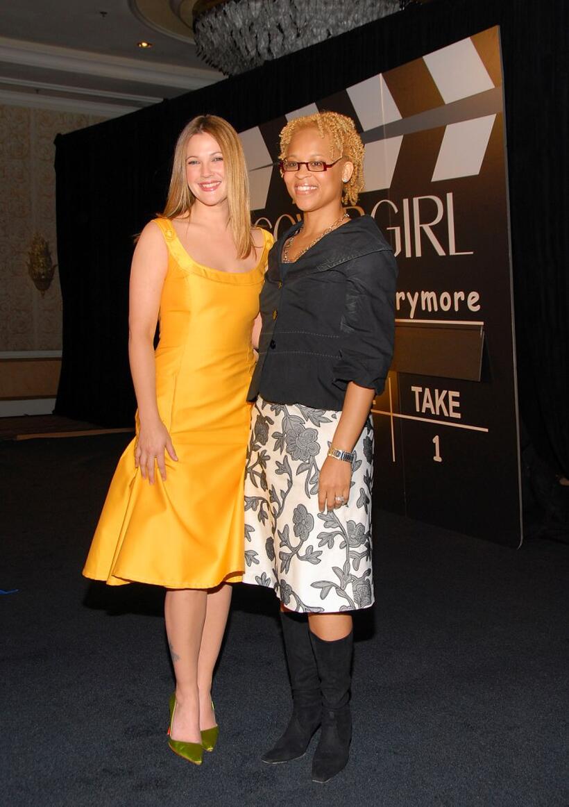 Drew Barrymore and Eggleston Bracey at the press conference to announce Barrymore as the newest face of CoverGirl Cosmetics.